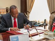 President Uhuru Kenyatta during a past signing. 14% interest rate cap for banks flops as MPs fail to meet quorum during debate