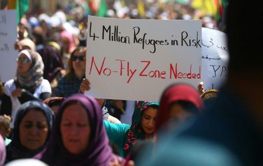 Kurdish protesters demand a no-fly zone in northern Syria on April 26, 2017, a day after after deadly Turkish air strikes