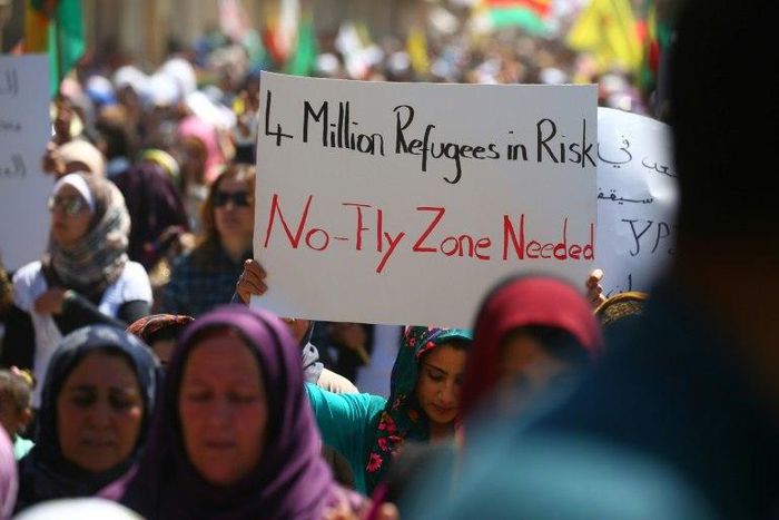 Kurdish protesters demand a no-fly zone in northern Syria on April 26, 2017, a day after after deadly Turkish air strikes