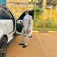 File image of controversial politician Steve Mbogo standing next to one of the high-end vehicles in his fleet DCI has impounded one of his Range Rovers