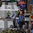 Emergency services work at the scene where a truck crashed into the Ahlens department store at Drottninggatan in central Stockholm, April 7, 2017