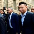 Han Li (R) and Marco Fassone (L), representatives of Chinese consortium Sino-Europe Sports (SES), arrive in Milan to finalize the deal with Fininvest for AC Milan's takeover by Rossoneri Sport Investment Lux on April 13, 201