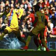 Crystal Palace's Christian Benteke controls the ball during their English Premier League match against Liverpool, at Anfield in Liverpool, on April 23, 2017
