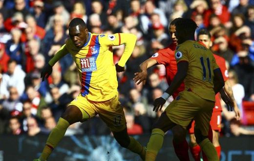 Crystal Palace's Christian Benteke controls the ball during their English Premier League match against Liverpool, at Anfield in Liverpool, on April 23, 2017