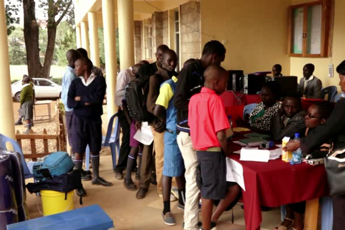 Parents and students during the Form 1 admission process at a Kenyan secondary school (Twitter)