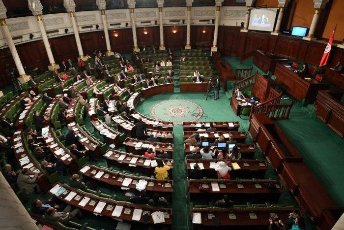 Tunisia's parliament voted to ease the country's harsh drug law to allow first-time offenders, mostly users of cannabis, to avoid jail