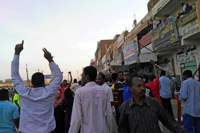 Sudanese police fired tear gas at demonstrators in the capital Khartoum against protesters chanting "Peace, justice, freedom"