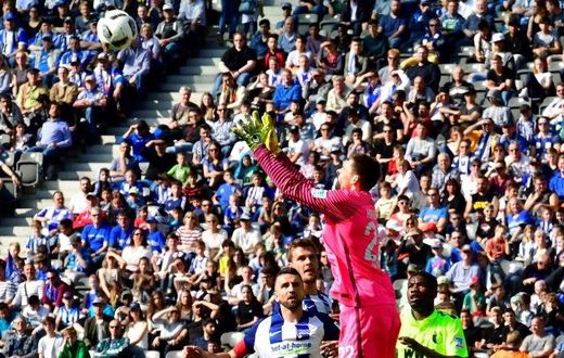 Berlin's Rune Almenning Jarstein makes a save during their match against Augsburg in Berlin on April 9, 2017