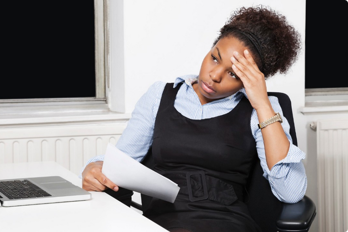 Stressed woman at work(KOKO TV Nigeria)
