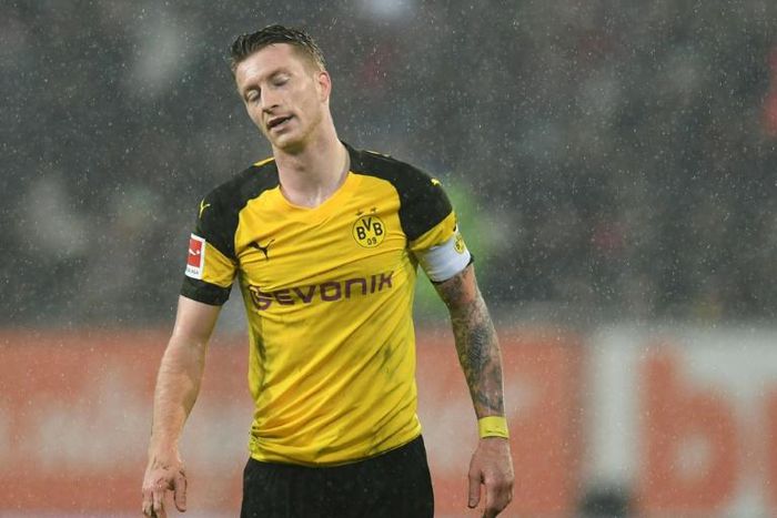 Germany star Marco Reus can not hide his disappointment after Borusia Dortmund crashed to a shock 2-1 defeat at Augsburg on Friday which dented their ambitions in the Bundesliga title race