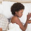 Estranged couple in bed
