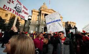 Denver teachers once hailed performance-based pay, but now they're on strike over it
