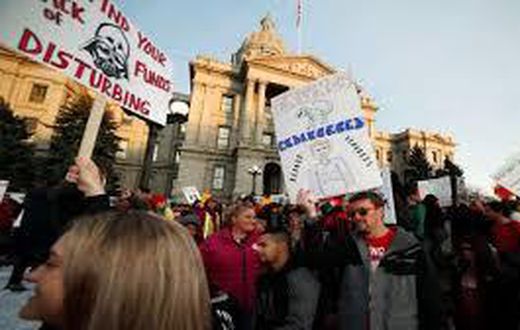 Denver teachers once hailed performance-based pay, but now they're on strike over it