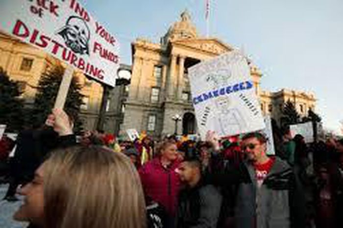 Denver teachers once hailed performance-based pay, but now they're on strike over it