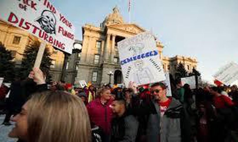 Denver teachers once hailed performance-based pay, but now they're on strike over it