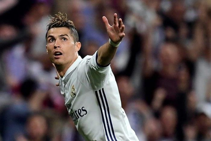 Real Madrid's Cristiano Ronaldo celebrates after scoring against Atletico Madrid during their Champions League match at the Santiago Bernabeu stadium on May 2, 2017