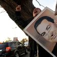 Supporters of Egypt's former president Hosni Mubarak chant slogans outside a military hospital in Cairo on March 2, 2017