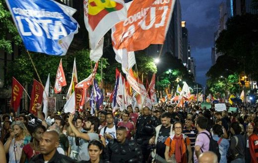 Demonstrators march in Rio de Janeiro against a social welfare reform bill introduced by the government of President Michel Temer