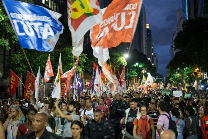 Demonstrators march in Rio de Janeiro against a social welfare reform bill introduced by the government of President Michel Temer