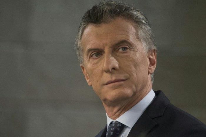 Argentinian President Mauricio Macri speaks during a joint press conference with Spanish Prime Minister at Moncloa Palace in Madrid on February 23, 2017