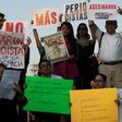 Journalists hold signs condemning violence against journalists while protesting the recent murder of the of Mexican journalist Javier Valdez on May 16, 2017 in Guadalajara
