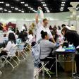 People visit a mobile free health clinic in Los Angeles - Life expectancy in the United States has dropped for the first time since the peak of the HIV/AIDS crisis more than 20 years ago