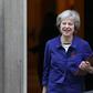 British Prime Minister Theresa May (L) emphasised to president-elect Donald Trump her wish to strengthen trade and investment with the US