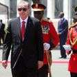 Turkey's President Recep Tayyip Erdogan (L) inspects an honor guard of Tanzania People's Defense Force soldiers during a welcoming ceremony at State House Grounds in Dar es Salaam on January 23, 2017