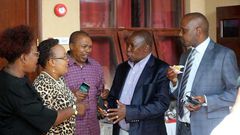 File image of Maina Kamanda (in black coat) with fellow leaders at a past function He has warned that the Mt Kenya region may form a coalition with other communities