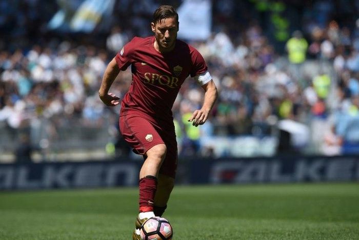 Roma's forward from Italy Francesco Totti controls the ball during the Italian Serie A match against Lazio at the Olympic Stadium in Rome on April 30, 2017