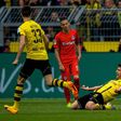 Dortmund's Sokratis Papastathopoulos celebrates after scoring a goal during their German first division Bundesliga match against Eintracht Frankfurt, in Dortmund, on April 15, 2017