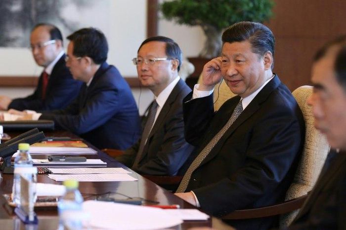 Chinese President Xi Jinping wants to rewrite world trade rules and cast himself as a champion of globalisation as he capitalises on a US retreat into "America First" policies, analysts say