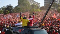 Uhuru Ruto rally (President Uhuru Kenyatta and his Deputy William Ruto wave to their supporters in the run up to the 2013 general elections at Uhuru Park, Nairobi