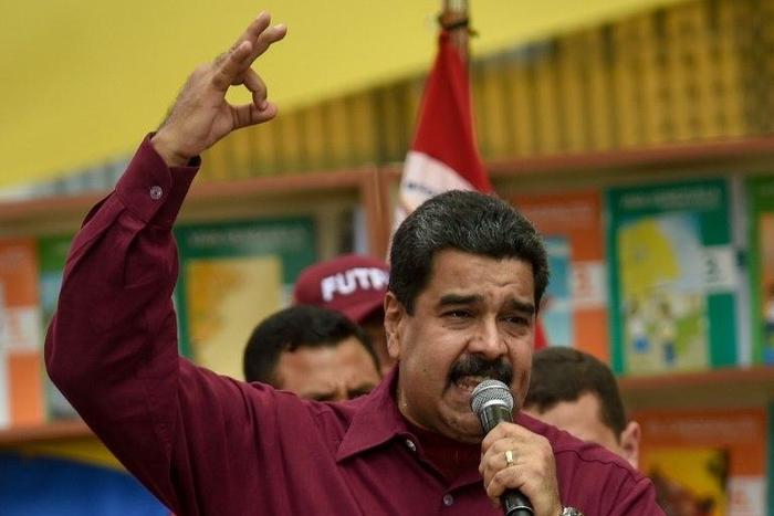 Venezuelan President Nicolas Maduro speaks during a meeting in Caracas on October 28, 2016