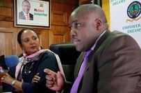 Education CS Amina Mohammed (left) and Helb boss Charles Ringera