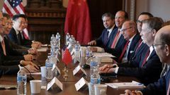 Beijing's trade envoy Liu He (L) meets with US Trade Representative Robert Lighthizer (R) at the Eisenhower Building near the White House
