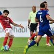 Ricardo Goulart (in red) of Guangzhou Evergrande shoots against Suwon Samsung Bluewings during their AFC Champions League match in Guangzhou, on May 9, 2017