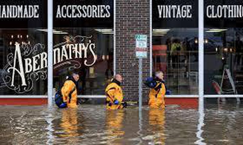 Floodwaters swept into Davenport, Iowa, sending residents scrambling