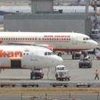 A politician has admitted hitting an air steward on an Air India flight with a slipper 25 times