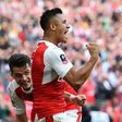 Arsenal's striker Alexis Sanchez (R) celebrates scoring against Manchester City at Wembley stadium in London on April 23, 2017