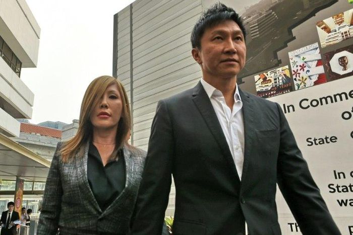 City Harvest Church founder Kong Hee (R) has had his jail sentence for misusing church funds to boost the career of his pop-singer wife Ho Yeow Sun (L) reduced on appeal