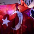 A protester waves a Turkish national flag during a demonstration in front of the Netherlands consulate in Istanbul on March 12, 2017