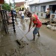Residents of the city of Barreiros clean their houses affectd by floods, due to heavy rains in Pernambuco state, northeastern Brazil, on May 30, 2017