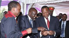 Abel Mutua with President Uhuru Kenyatta