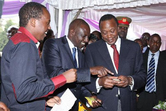 Abel Mutua with President Uhuru Kenyatta