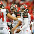 Roberto Aguayo (R) of the Tampa Bay Buccaneers is congratulated by teammates after kicking a field goal during a NFL game at Georgia Dome in Atlanta, in September 2016
