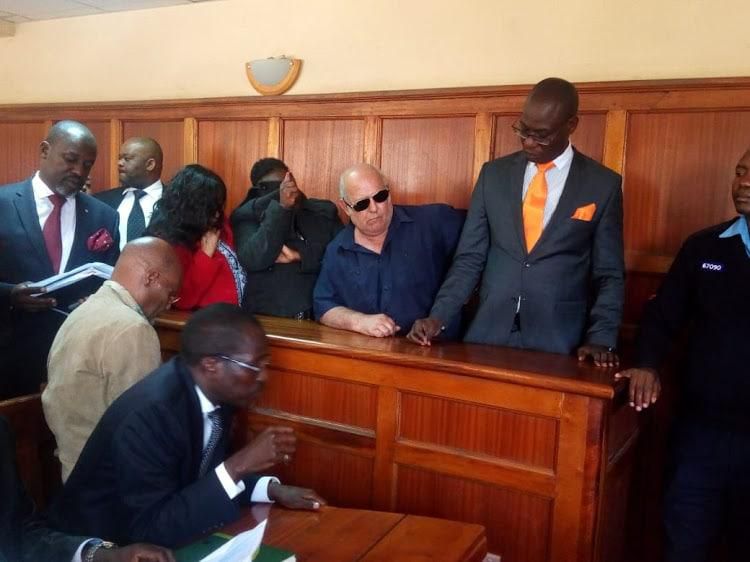 The four suspects during a past court session