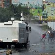 Opposition activists clash with the riot police during a demonstration against President Nicolas Maduro's government in Caracas, on May 29, 2017