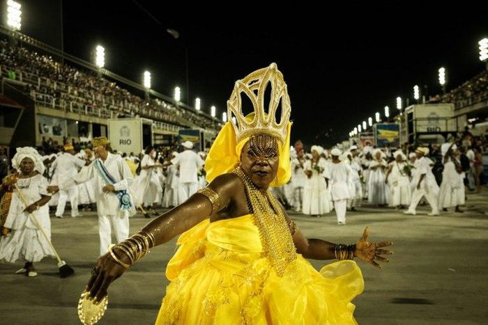 Revellers take part in a ceremony to purify the Sambadromo stadium on February 19, 2017, in preparation for Rio's carnival