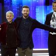 Ellen DeGeneres (L) accepts the award for favorite animated movie voice for 'Finding Dory' during the People's Choice Awards in Los Angeles, California on January 18, 2017